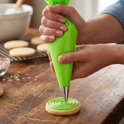 Décoration biscuit rond avec Poche à douille