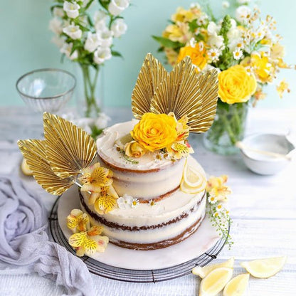 Decoration gateau avec multiple fleur et lance plamiers 