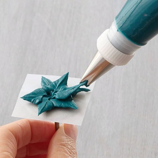 Douille patisserie  avec  décoration  florale toujours couleur verte foncée