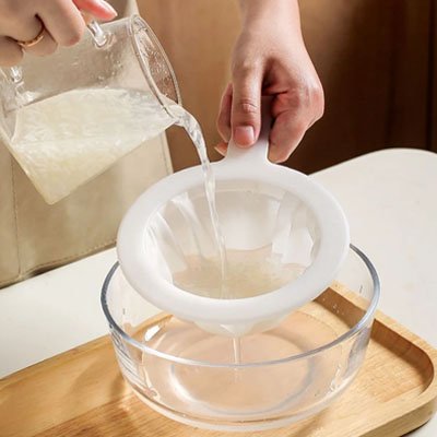  Filtration eau avec Passoire