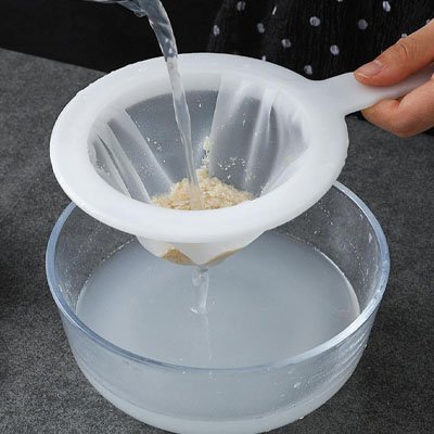 Filtration liquide avec Passoire