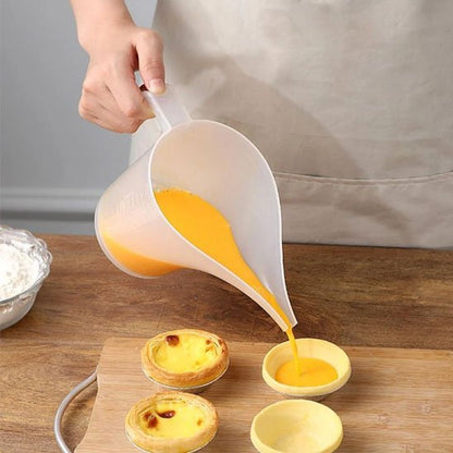 versement pate à tartelette avec Verre doseur